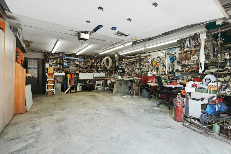 Garage filled with stored items and tools